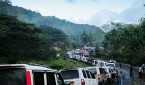 A queue of vehicles waiting along the Andaman Trunk Road